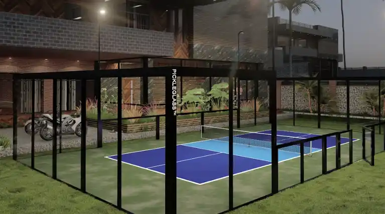 Reendering showing a residential backyard court with lighting.